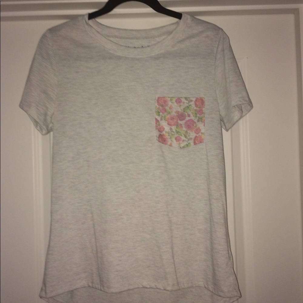 cream graphic tee with floral front pocket